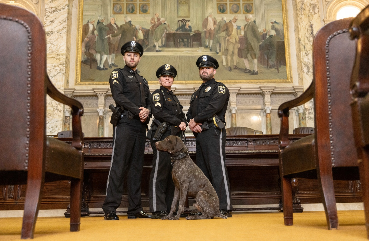 Three Court Protection Officers and K9 Gator in the Supreme Court
