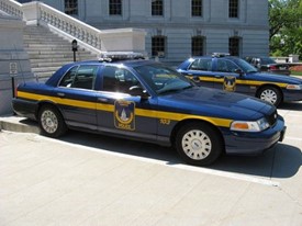 Squad car from the Chief Heinle era in front of the Capitol