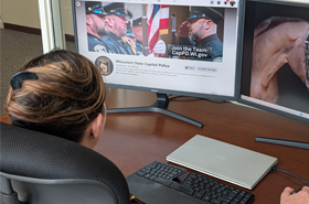 Woman Accessing the Wisconsin State Capitol Police Facebook Page